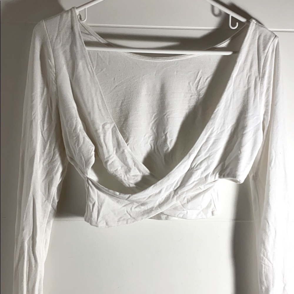 white long sleeved crisscross top